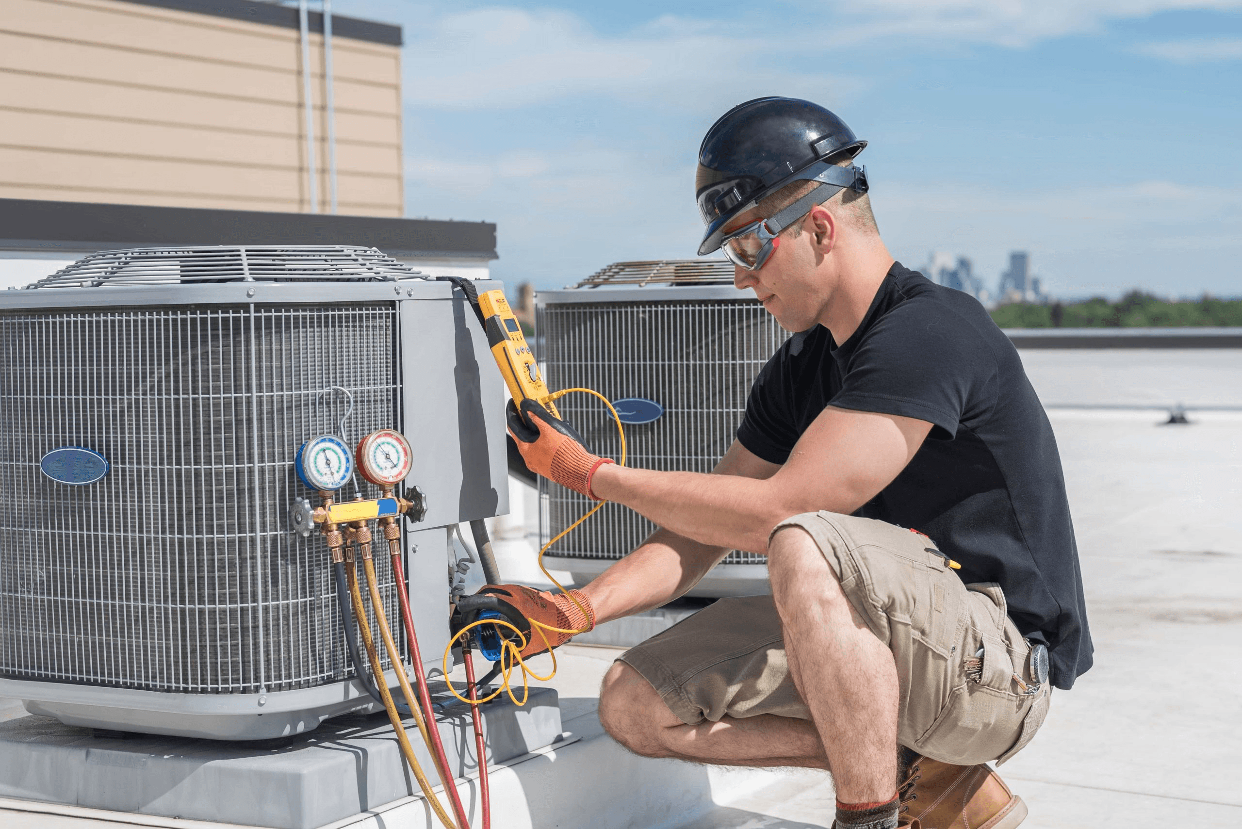 ApexHVAC technician working on HVAC unit